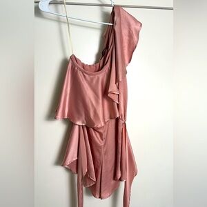 Off shoulder silky pink dress.